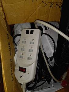 lot 9893 image: box of electronics with a projector
