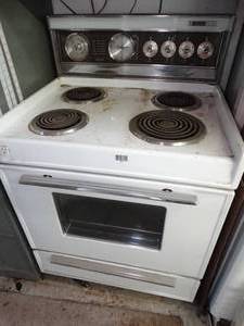 lot 1050 image: Cool Vintage Wizard Holiday Electric Stove
