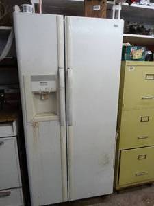 lot 1061 image: Frigidaire Side by Side Contents Not Included
