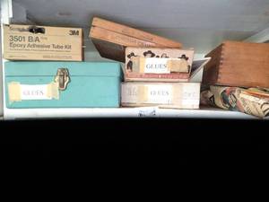 lot 1112 image: Adhesives  Glues  Tire Repair  Plastic Letters  Water Dispenser  Etc