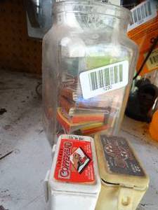 lot 1230 image: .22 Cal Pellets  Match Books  Kraken Cards