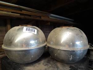 lot 1388 image: 2 Round Vintage Metal Oil Heaters