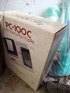 lot 1342 image: Texas Instruments Model PC-100C Print-Security Cradle  in Original Box