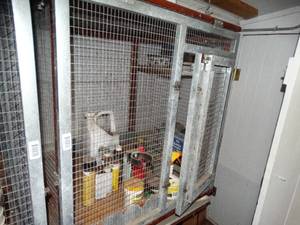 lot 1408 image: Quality rabbit Hutch with Contents