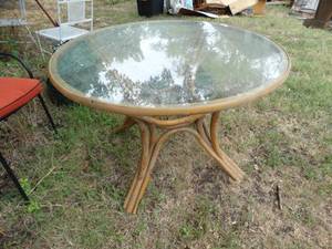 lot 1545 image: Round Wicker 4Ft Glass Topped Table