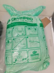 lot 8565 image: Grain Pro 54lb Bag of Rice