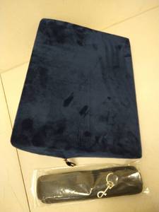 lot 9169 image: small navy blue wedge pillow with strap