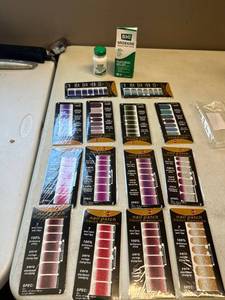 lot 880 image: 2 item Lot. Migraine relief tablets, stick on nails nail polish