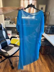 lot 881 image: 2 Item Lot. Wine Tumblr, swimsuit cover-up