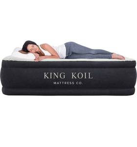 lot 1076 image: King Koil Luxury California King Air Mattress with Built-in Pump for Home, Camping & Guests Retails $179