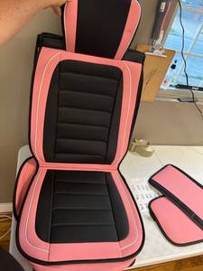 lot 1119 image: Four seat bucket seat covers. pink With console cover