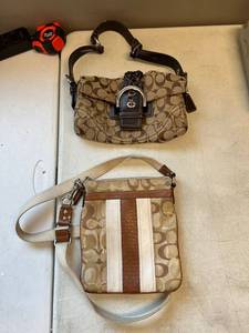 lot 1143 image: coach purse pair