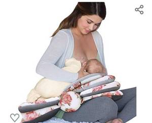 lot 233 image: Infantino Elevate Adjustable Nursing and Breastfeeding Pillow - with multiple angle-altering layers for proper positioning to aid in feeding even as your baby grows, floral