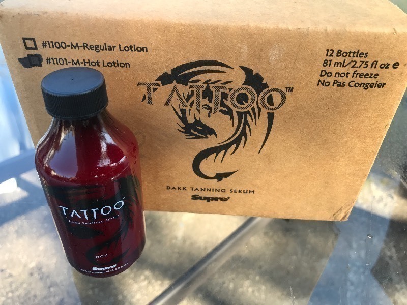lot 220 image: 12 Bottles of Tanning Lotion