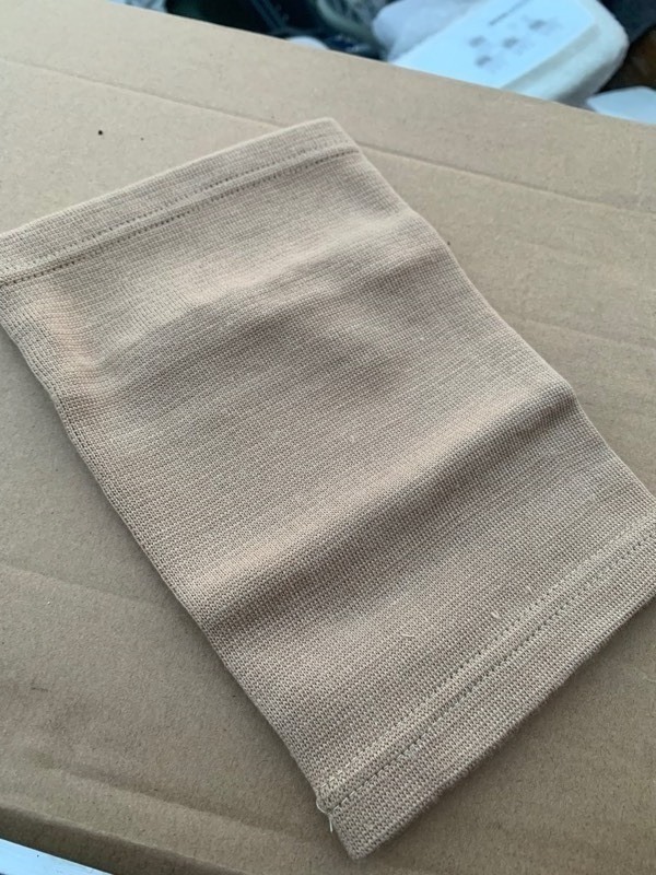 lot 320 image: 10 New Nude Colored Knee Base Sleeve