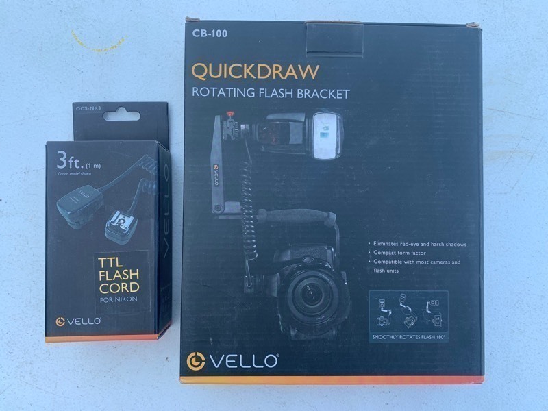lot 216 image: New Vello QuickDraw Rotating Flash Bracket & TTL Flash Cord