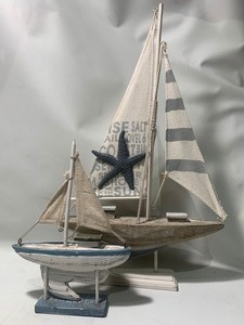 lot 31 image: 2 Matching Themed Wooden Decor Sail Boats 6 and 10