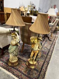 lot 1025 image: Sets of two plaster lamps girl is damaged at base 48 inches tall