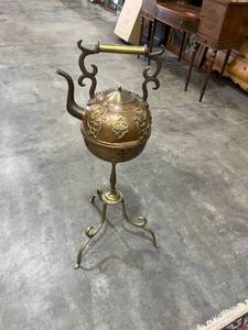 lot 1031 image: Copper kettle on stand 41 inches