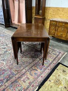 lot 1032 image: Gateleg drop leaf game table and 35 x 69 x 44