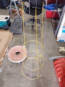 lot 1105 image: Tomato cages and rolling pot stand