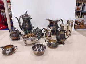lot 1142 image: Silver plate pitchers