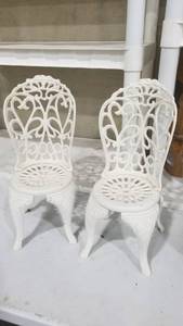 lot 2021 image: 2 cast iron chairs approx 15 tall