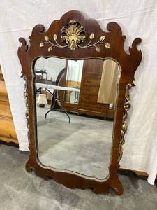 lot 1075 image: Wood framed mirror with gold highlights