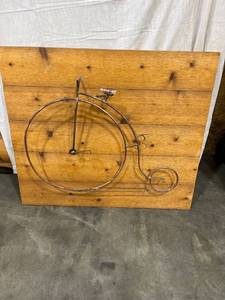 lot 1078 image: Copper bicycle on wood
