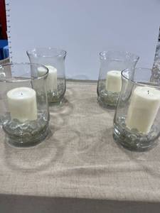 lot 1151 image: Set of four hurricane lamps with candles and beads