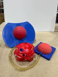 lot 1220 image: A balancing ball and a rocket launcher
