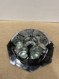 lot 1228 image: A ring of candleholders on a mirrored tray