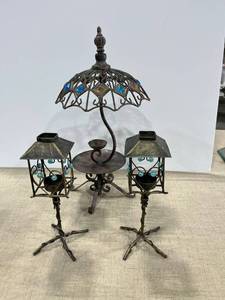 lot 1171 image: Three metal candleholders
