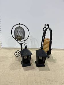 lot 1177 image: An iron birdhouse and three candleholders