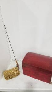 lot 2067 image: Red trunk, fishing pole and straw