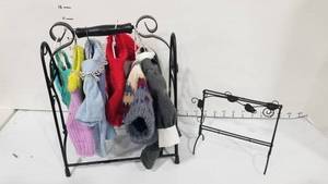 lot 2101 image: Metal clothes rack and doll clothes