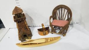 lot 2102 image: Tree housefort, chair, canoe and metal tin