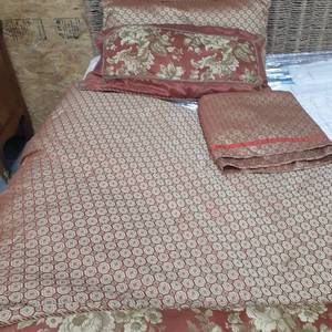 lot 3043 image: King size bedding. Comforter and shams are reversible. Comes with bed skirt
