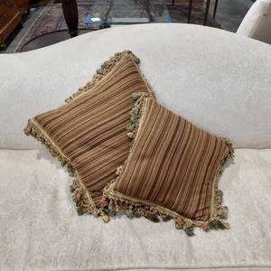 lot 3046 image: (2)Throw pillows. One is slightly bigger