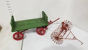 lot 2090 image: Toy hayrack wagon and metal hay rake