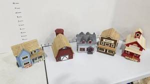 lot 2093 image: Small wooden town stores, houses and barn