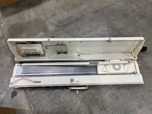 lot 1321 image: Brother knitting machine with stand and accessories