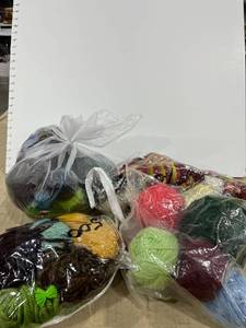lot 1325 image: Bags of yarn