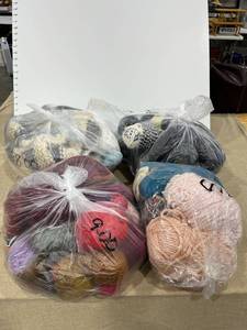 lot 1327 image: Bags of yarn