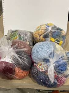 lot 1329 image: Bags of yarn