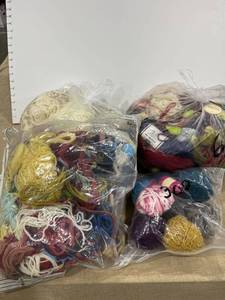 lot 1332 image: Bags of yarn