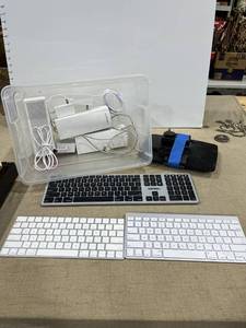 lot 1380 image: Linksys router, computer speakers and various keyboards