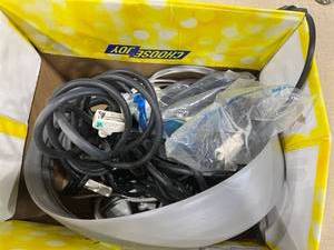 lot 1386 image: A box of power cords, cords and protectors