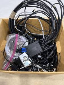 lot 1387 image: A box of electronics and other electric cords