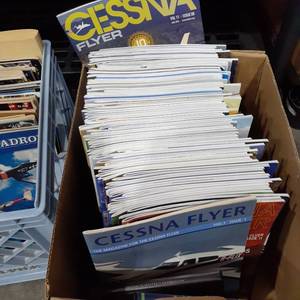 lot 1529 image: Magazine. Cessna Flyer. Approximately August 2004 to August 2014. Missing some magazines. Not complete years